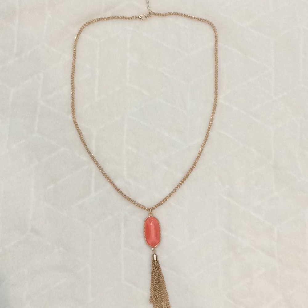 Gold necklace with coral pendant